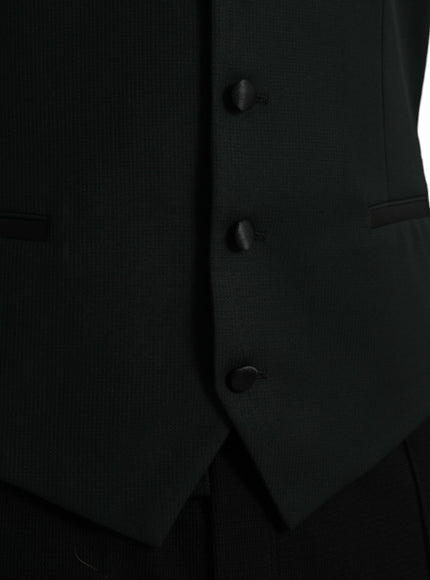 a close up of a black suit with buttons