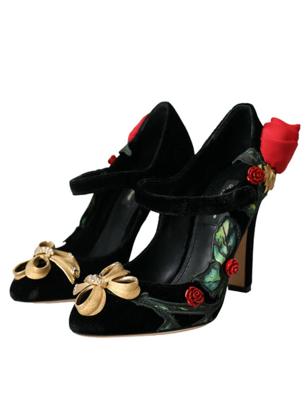 a pair of black high heels with roses on them