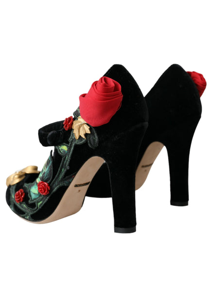 a pair of black high heels with roses on them