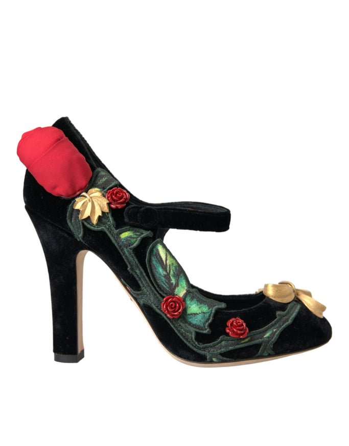 a pair of black high heels with roses on them