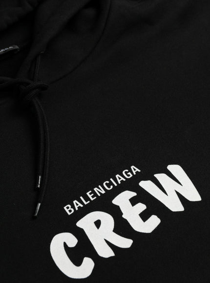 Balenciaga CREW logo close-up on black pullover