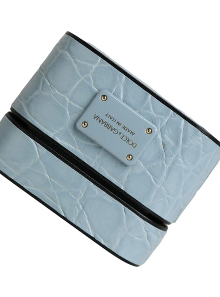 a blue wallet with a name tag on it