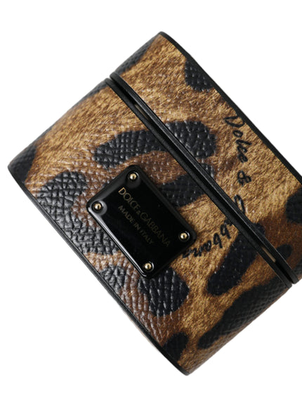 a brown and black purse with a tag on it