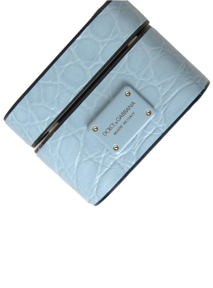 a small blue wallet with a name tag on it