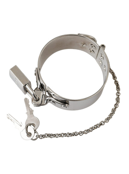 a pair of handcuffs with a key on a chain