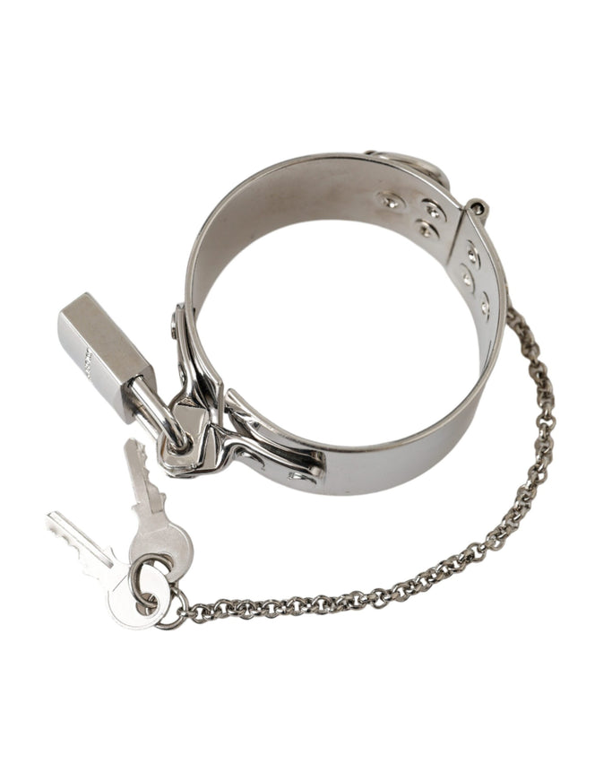 a pair of handcuffs with a key on a chain