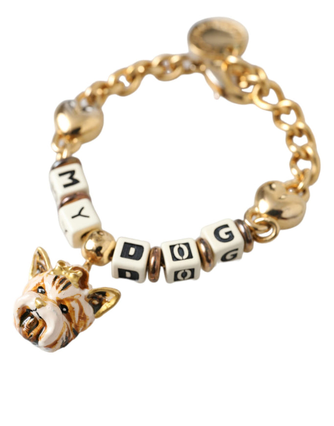 a gold bracelet with a dog charm on it