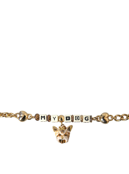 a gold bracelet with a dog head on it