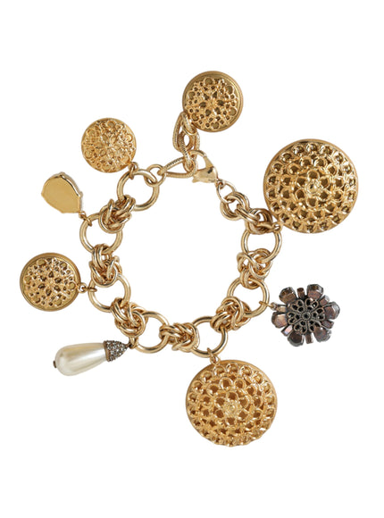 a gold bracelet with different charms on it