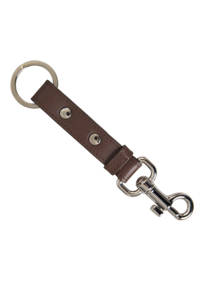 a brown leather keychain with a metal ring