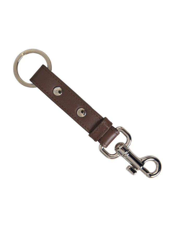 a brown leather keychain with a metal ring