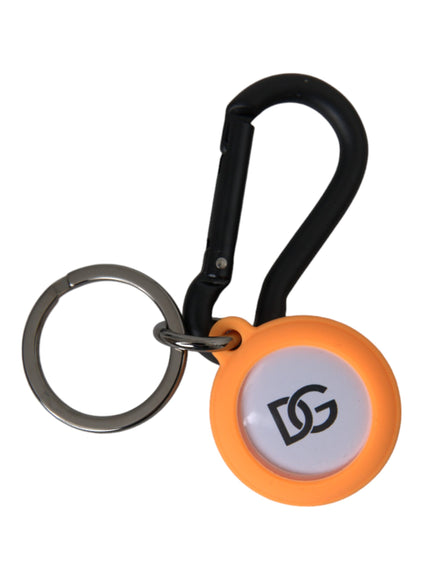 an orange and white keychain with a black handle