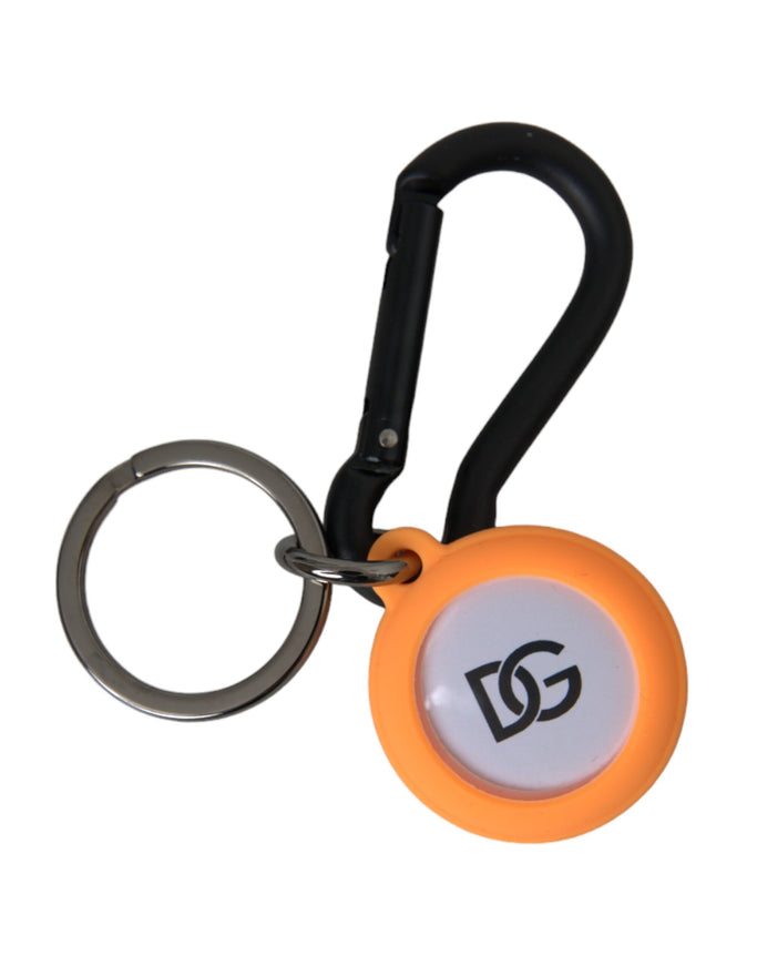 an orange and white keychain with a black handle