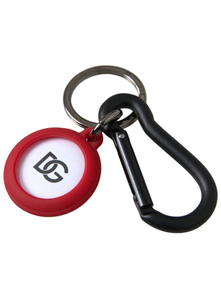 a red and black keychain with a black handle