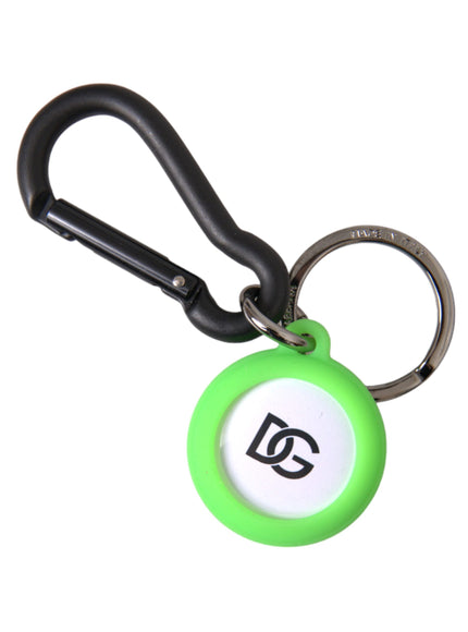 a green and white keychain with a black handle