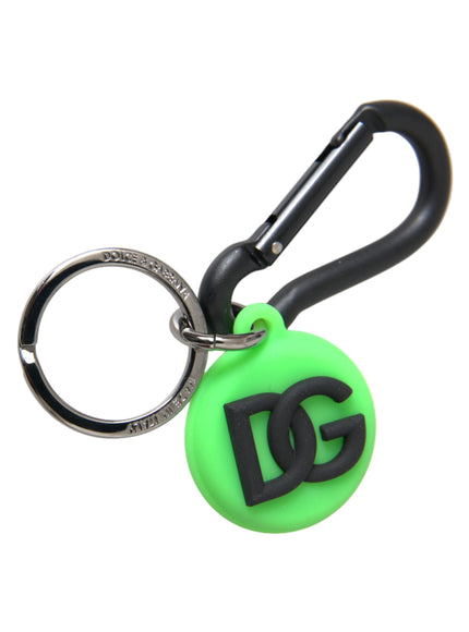 a green key chain with a black dg logo on it