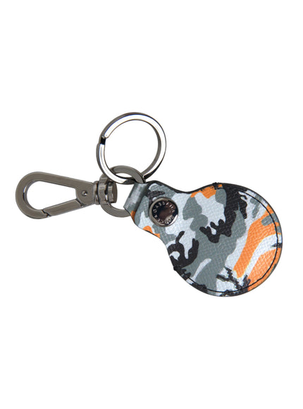 a keychain with a camo design on it