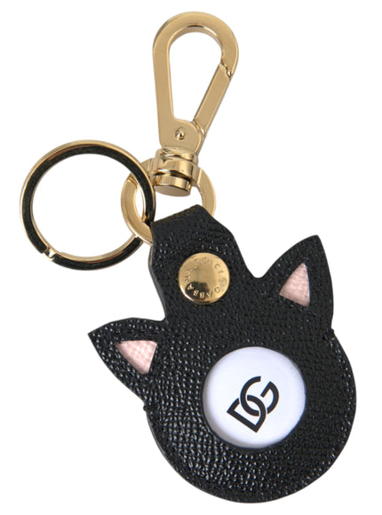 a key chain with a black cat on it