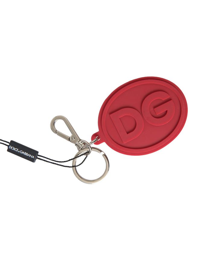 a red keychain with a logo on it