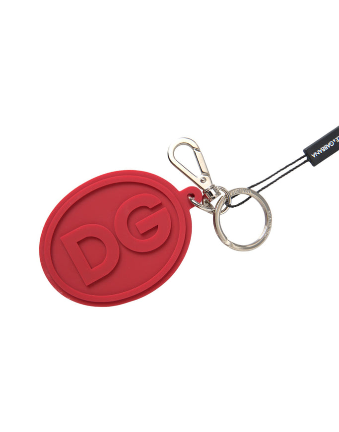 a red keychain with a logo on it