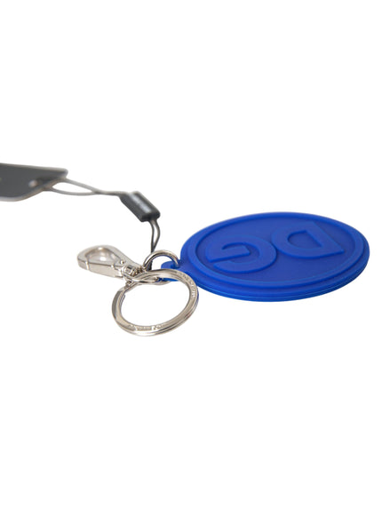 a key chain with a blue disc on it