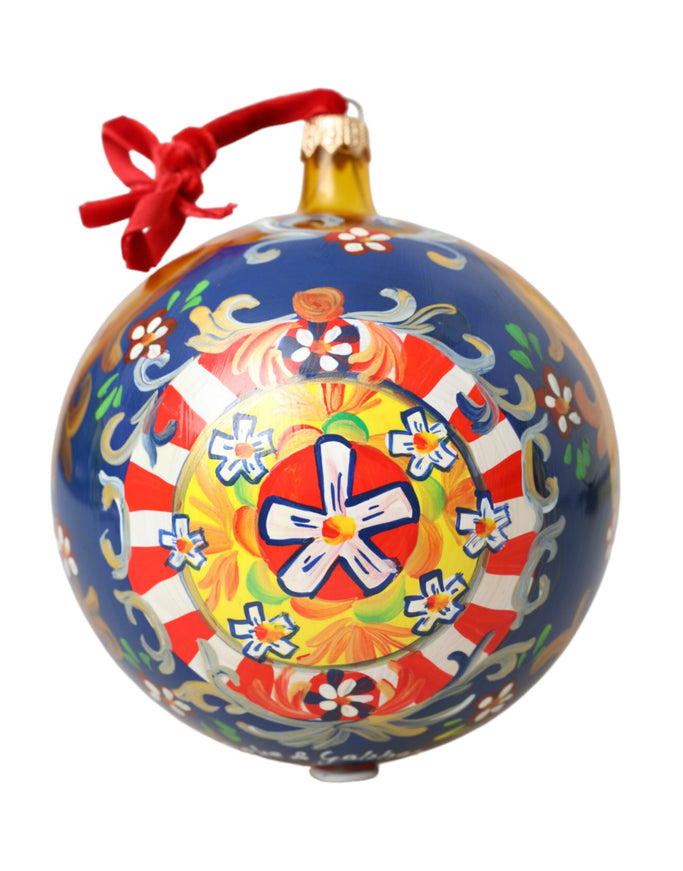 a blue ornament with a red ribbon around it