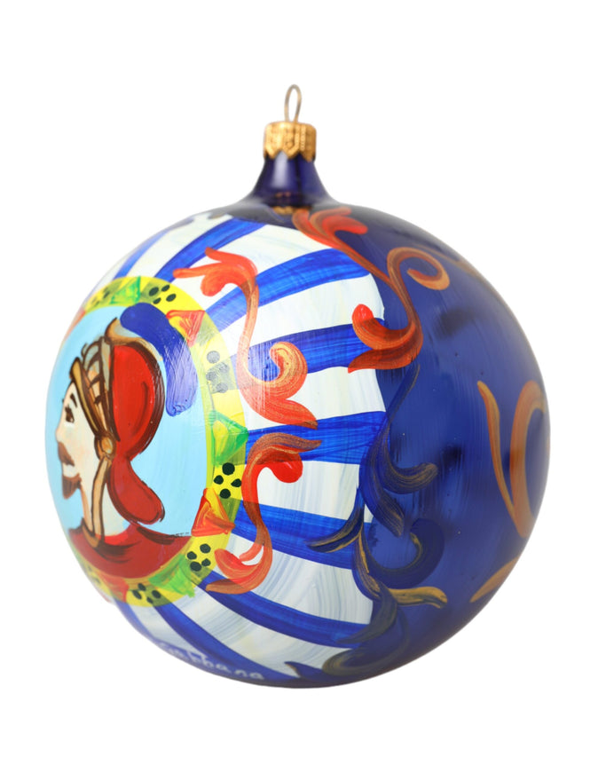 a blue ornament with a picture of a woman on it