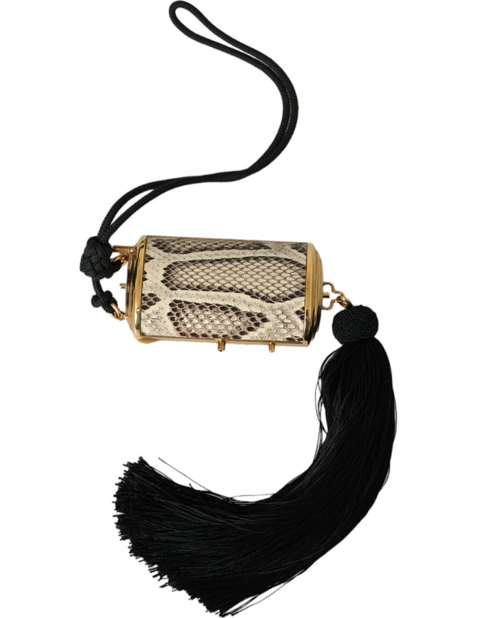 a snake skin purse with a tassel