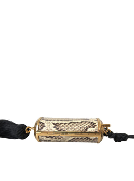 a snake skin purse with a tassel