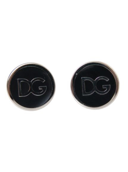 a pair of black and white cufflinks with the letter dg on them