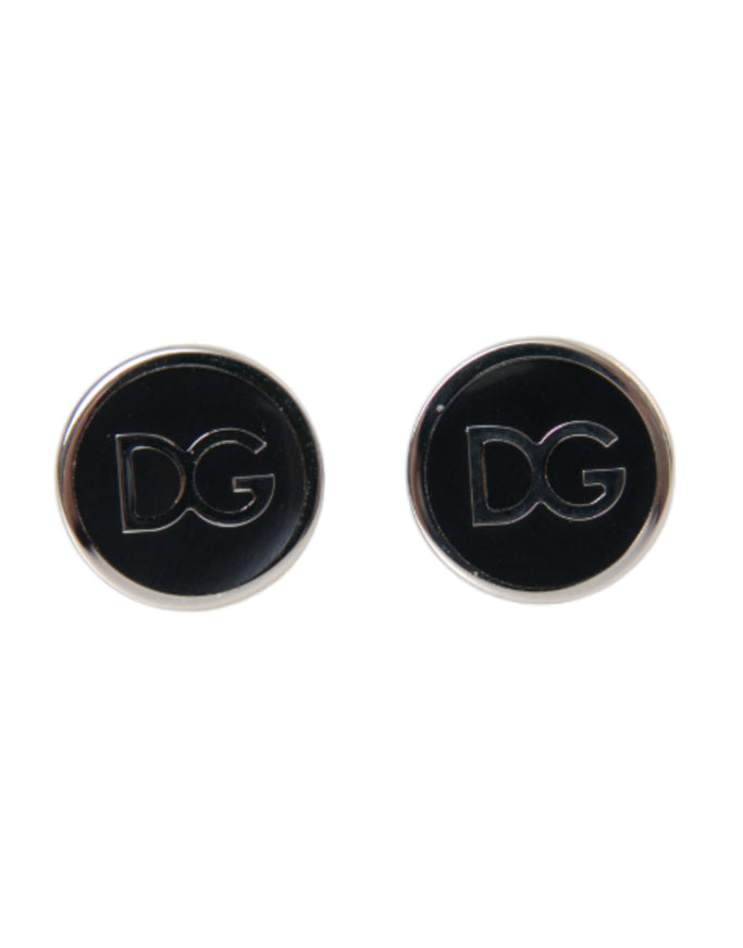 a pair of black and white cufflinks with the letter dg on them