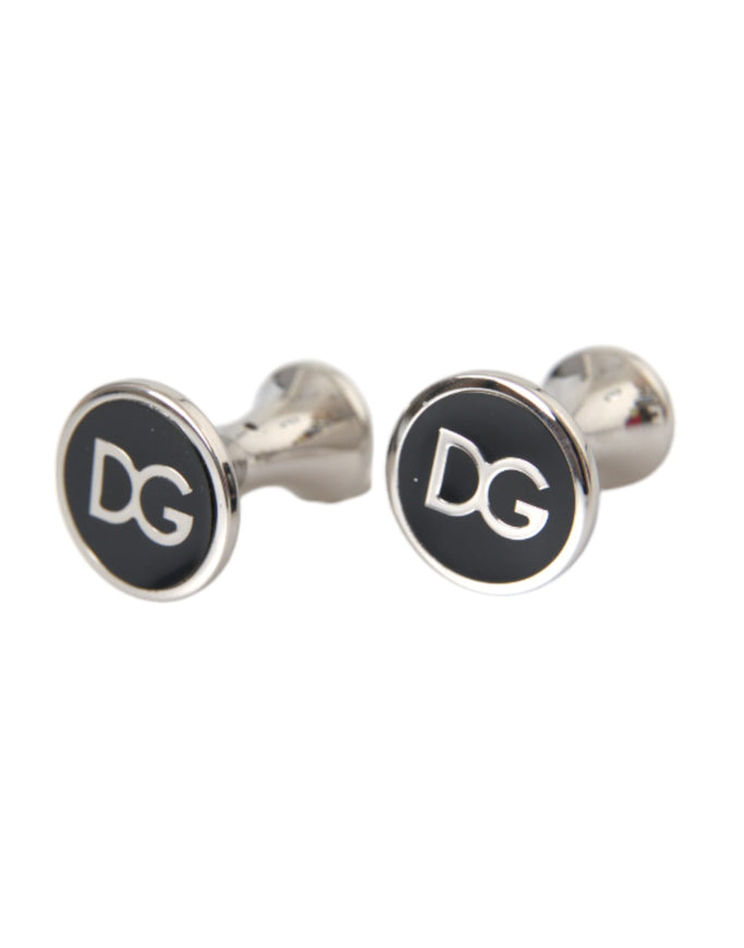 a pair of black and silver cufflinks with the letter dg on them