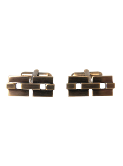 a pair of metal clips on a white background