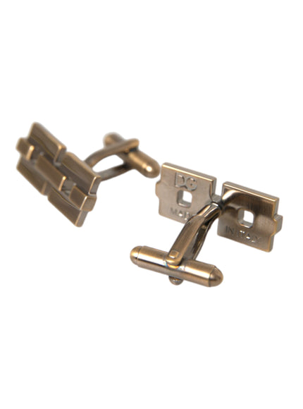 a pair of metal clips on a white background