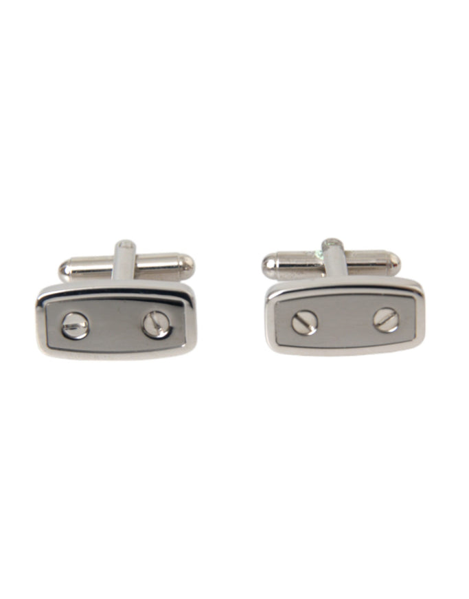 a pair of silver cufflinks on a white background