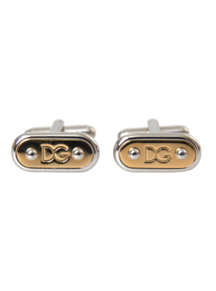 a pair of silver and gold cufflinks