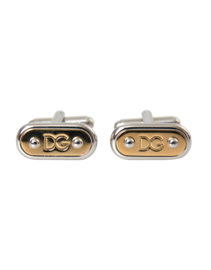 a pair of silver and gold cufflinks