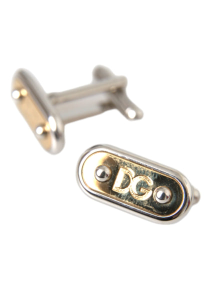 a close up of a pair of cufflinks