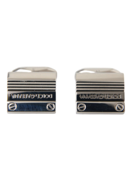 a pair of silver cufflinks with a black and white stripe