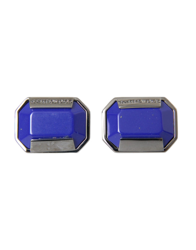 a pair of blue and silver cufflinks