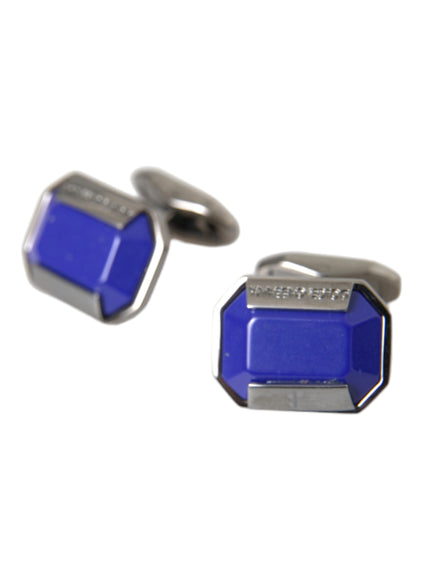 a pair of blue and silver cufflinks