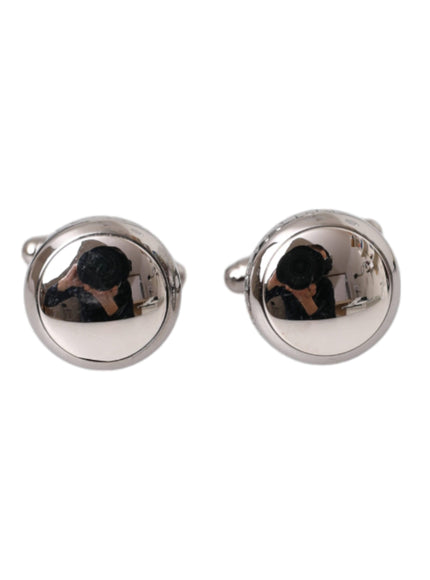 a pair of cufflinks with a picture of a dog