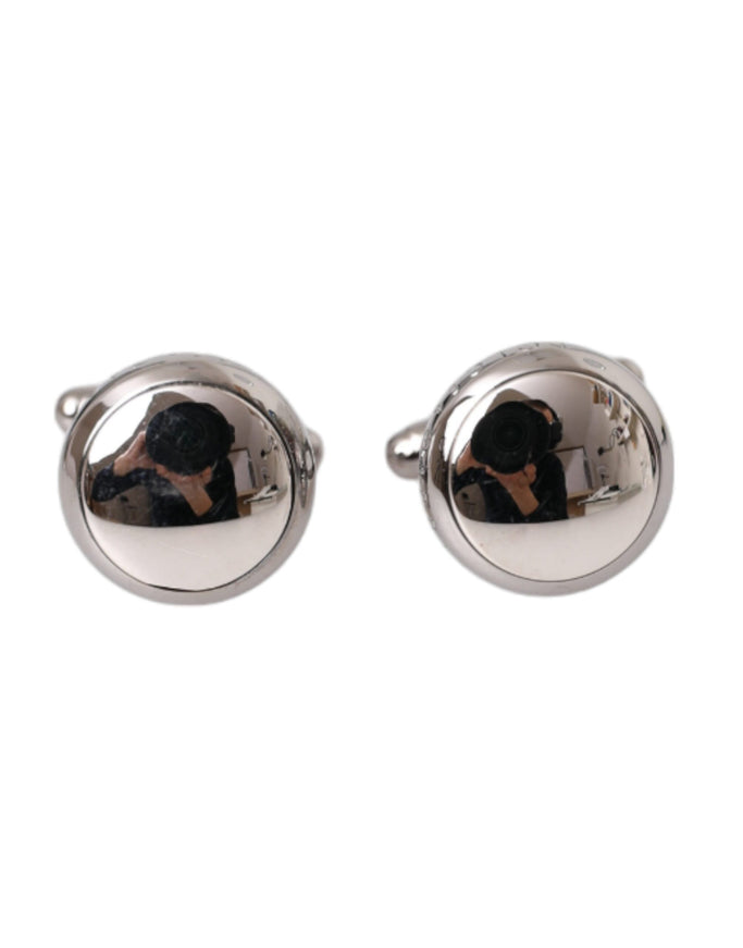 a pair of cufflinks with a picture of a dog