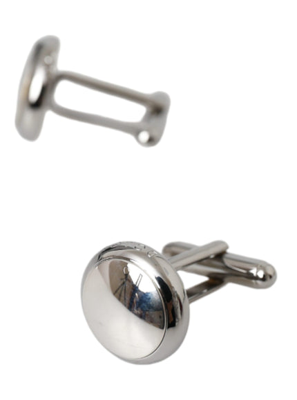 a close up of a pair of cufflinks