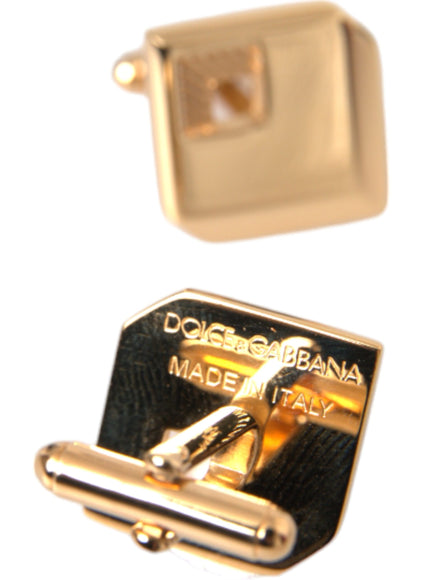 Close-up of Dolce & Gabbana branding on cufflinks