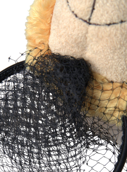 Detail of black netting on Dolce & Gabbana hair band