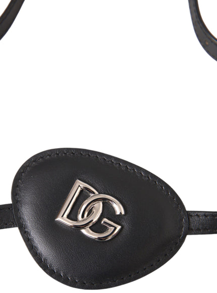 Close-up of DG logo on black leather eye patch