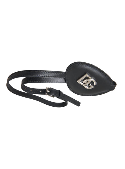 Side view of black leather eye patch with DG logo