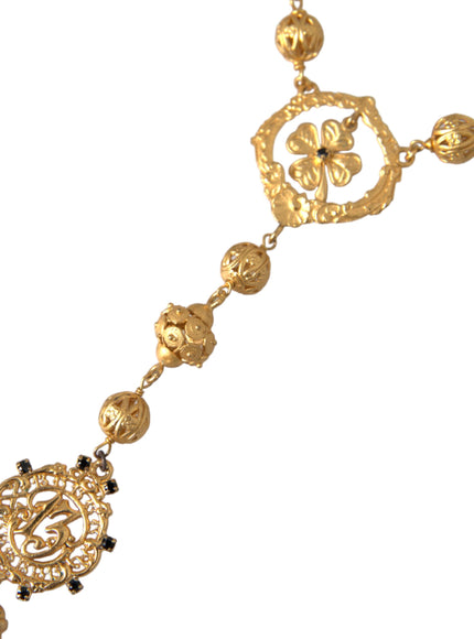 Close-up of gold beaded necklace with intricate design