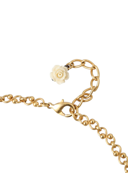 Gold chain necklace with floral clasp detail